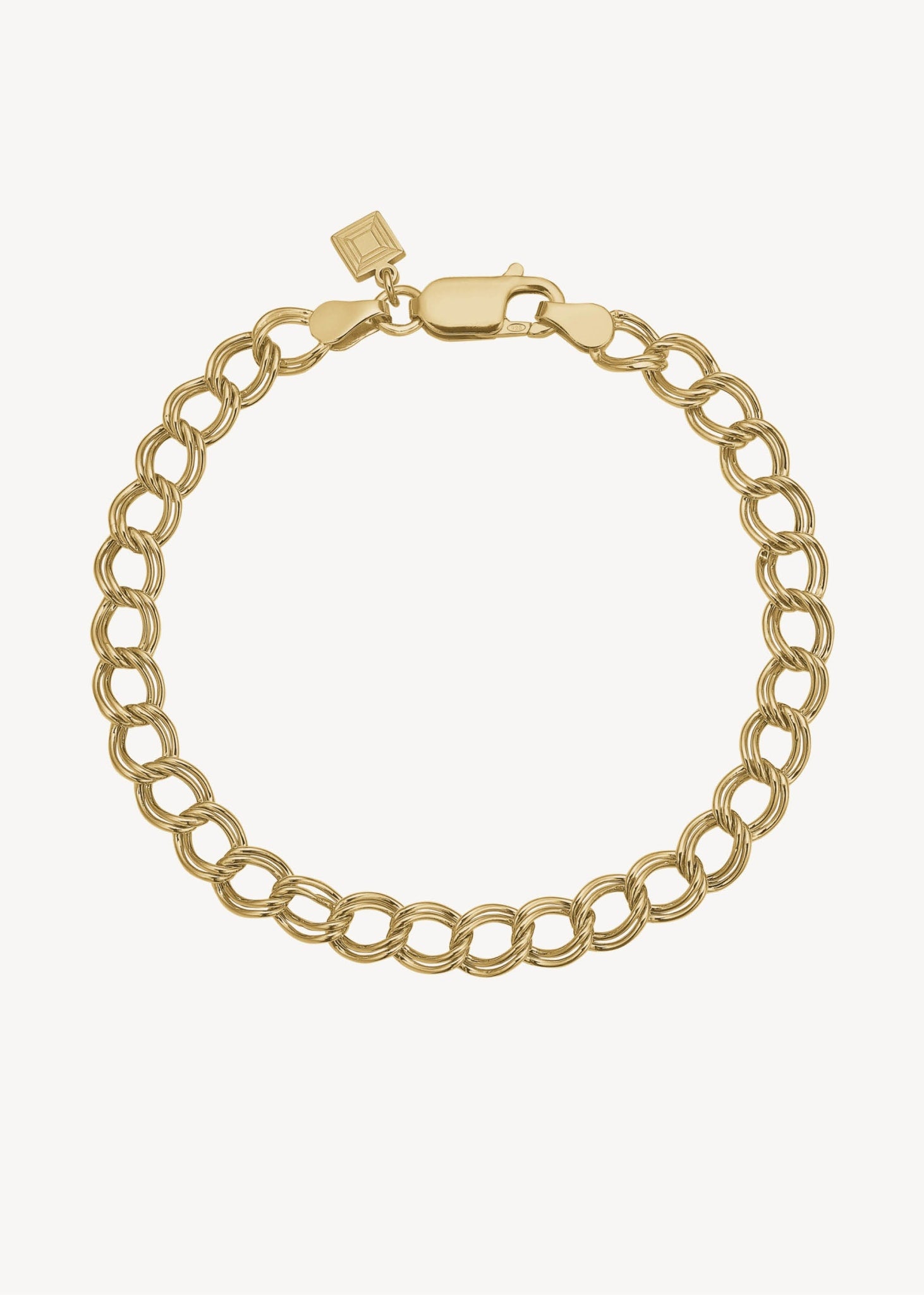 Smukt armbånd i guldbelagt sterling sølv med dobbelt rombo led i chunky stil, perfekt gave til ham og gave til hende i sølv