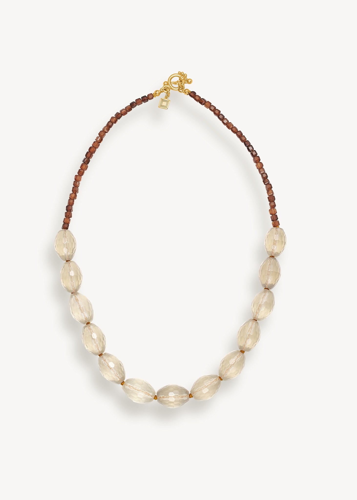 Statement halskæde fra carré jewellery med guldbelagt sterling sølv bidsellås og små orange turmalin ædelsten og store lemon kvarts ædelsten