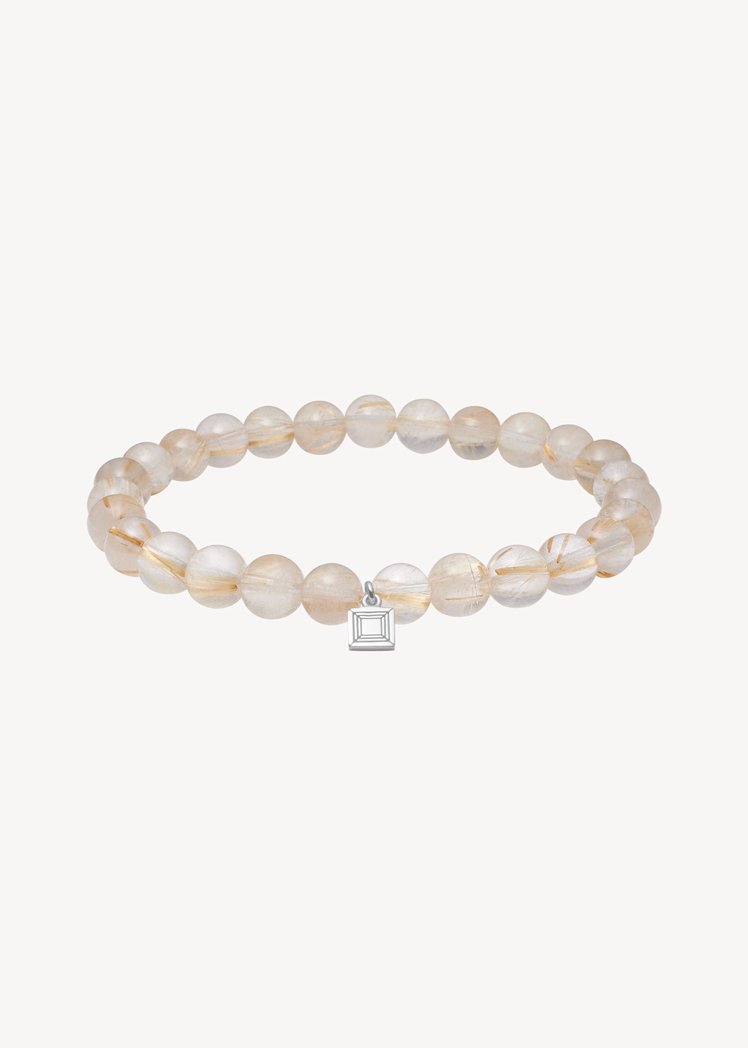 Lido slip on armbånd til mænd fra carré jewellery med gyldne rutil kvarts ædelsten og et sølv tag