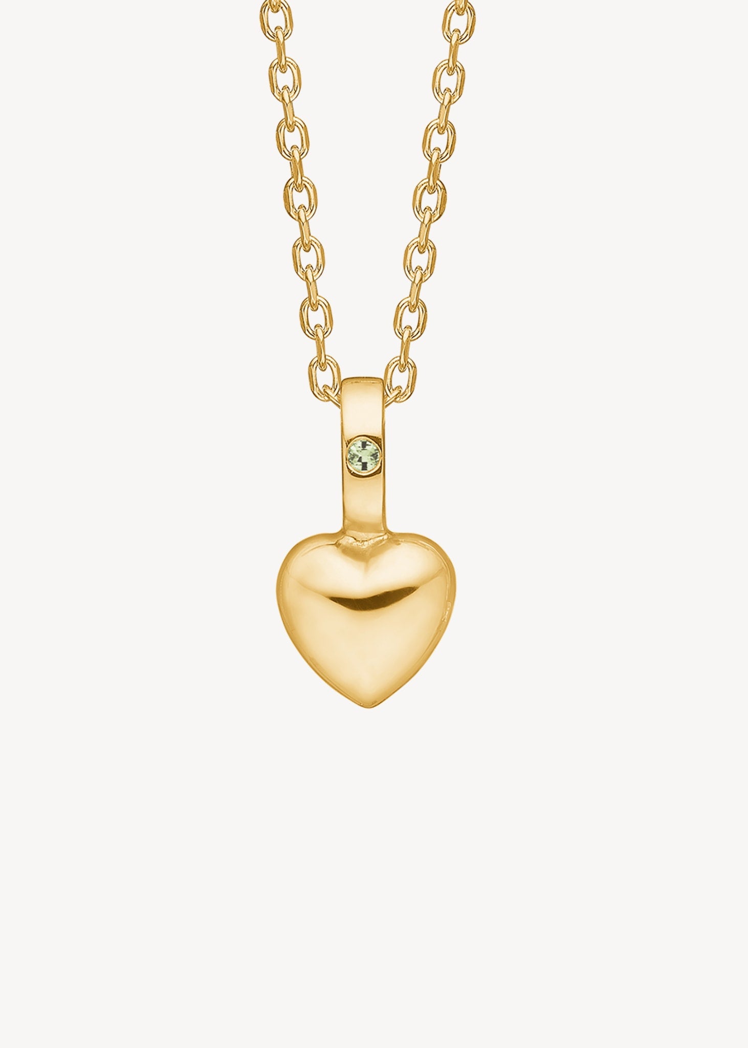 Hjertevedhæng i 10-karat ægte guld til halskæder fra carré jewellery sat med en facetskevet peridot ædelsten