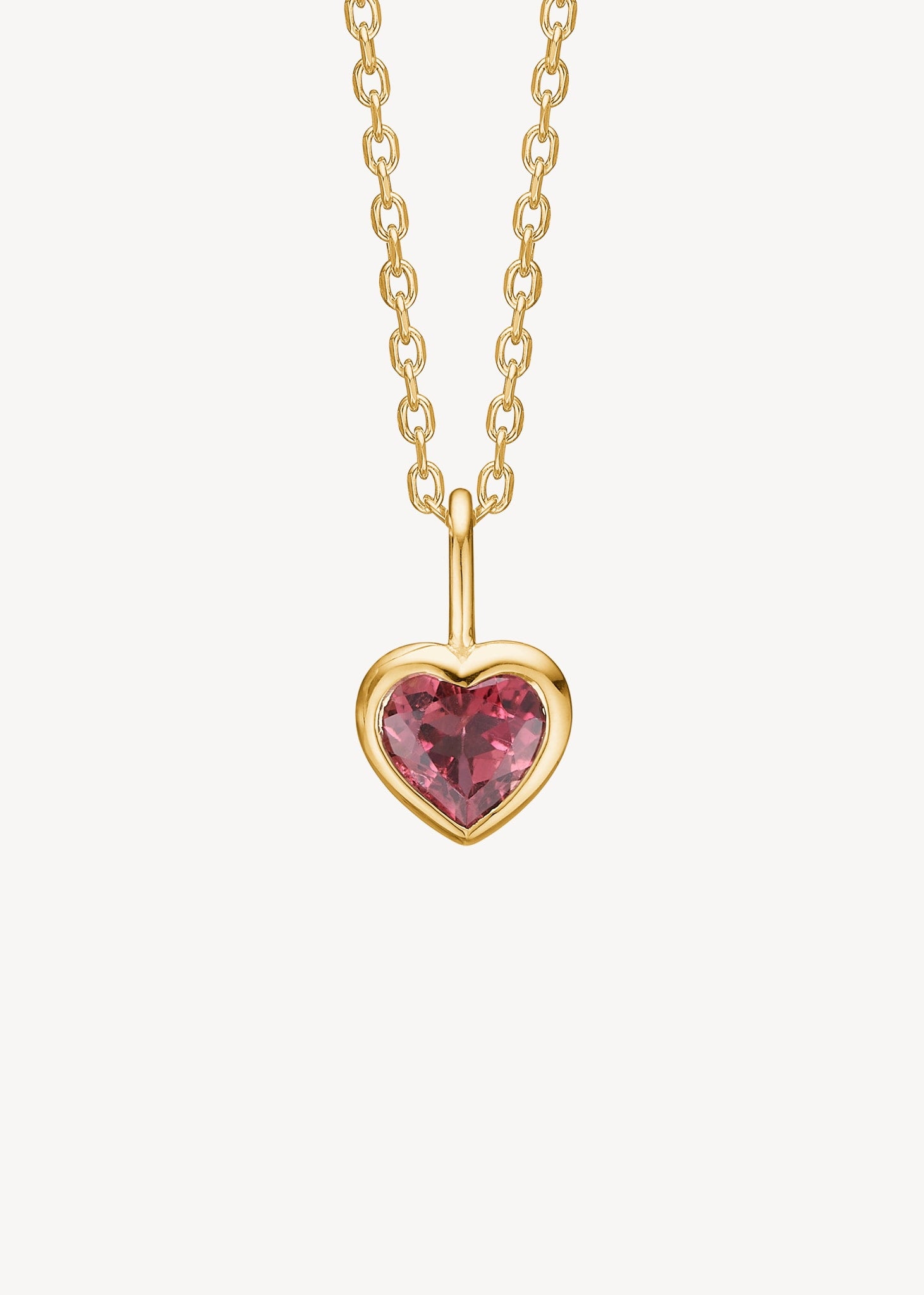 Lille sødt hjertevedhæng til halskæder i ægte 10 karat guld med lyserød turmalin ædelsten fra Carré Jewellery