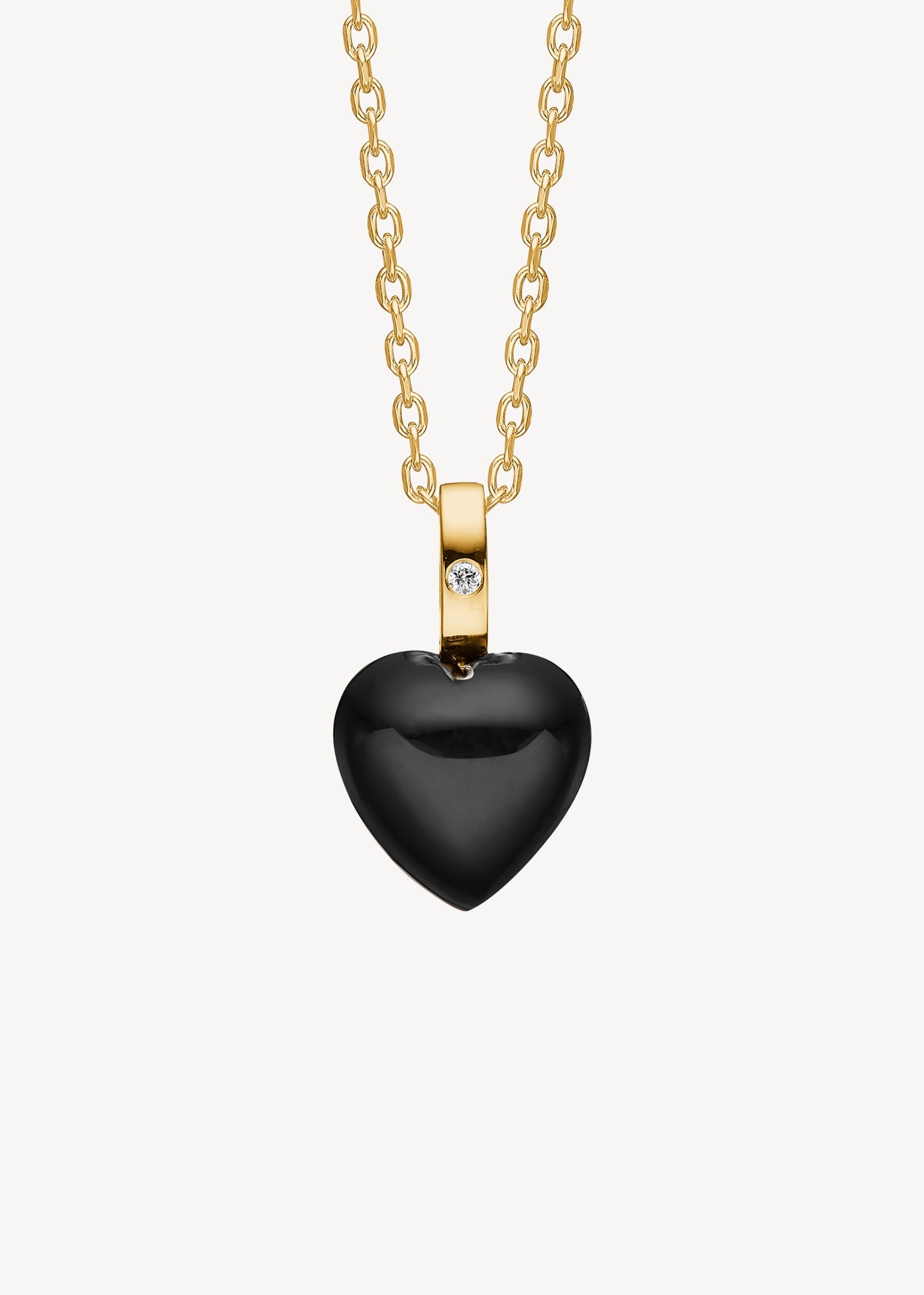 Hjerte vedhæng til halskæder med en diamant i ægte 10 karat guld med en hjerteformet sort agat ædelsten fra Carré Jewellery