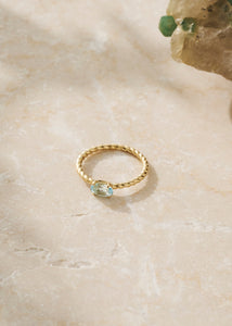 10-karat Tresser ring med blå topas