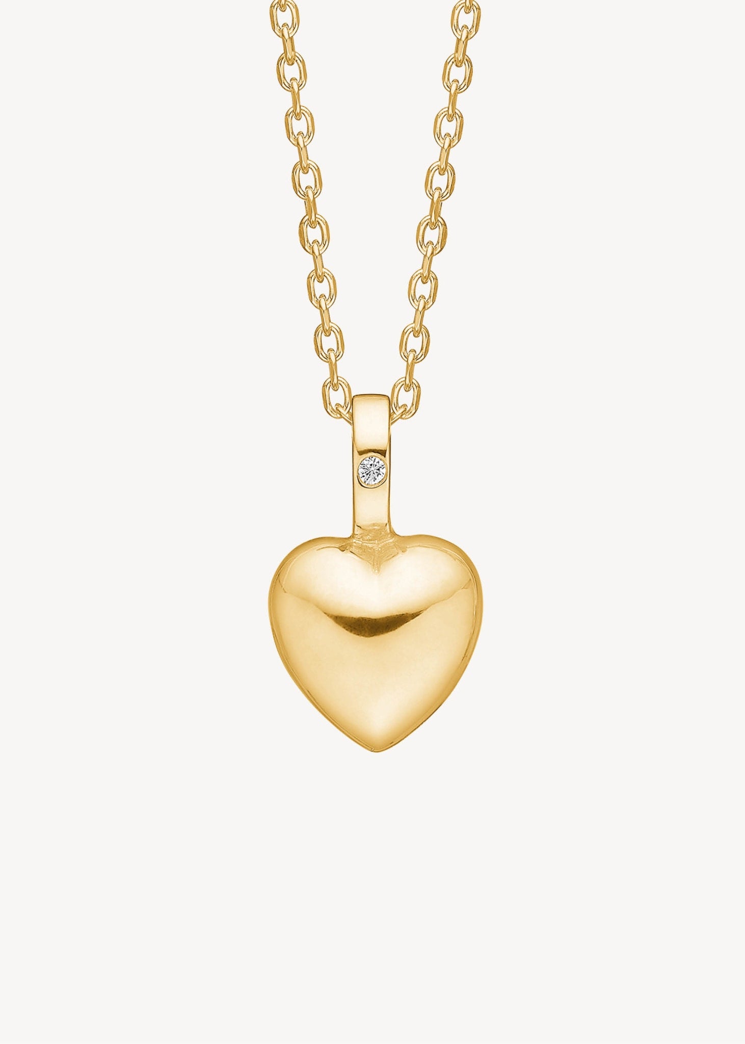 Hjertevedhæng i ægte guld til halskæder fra carré jewellery sat med en diamant