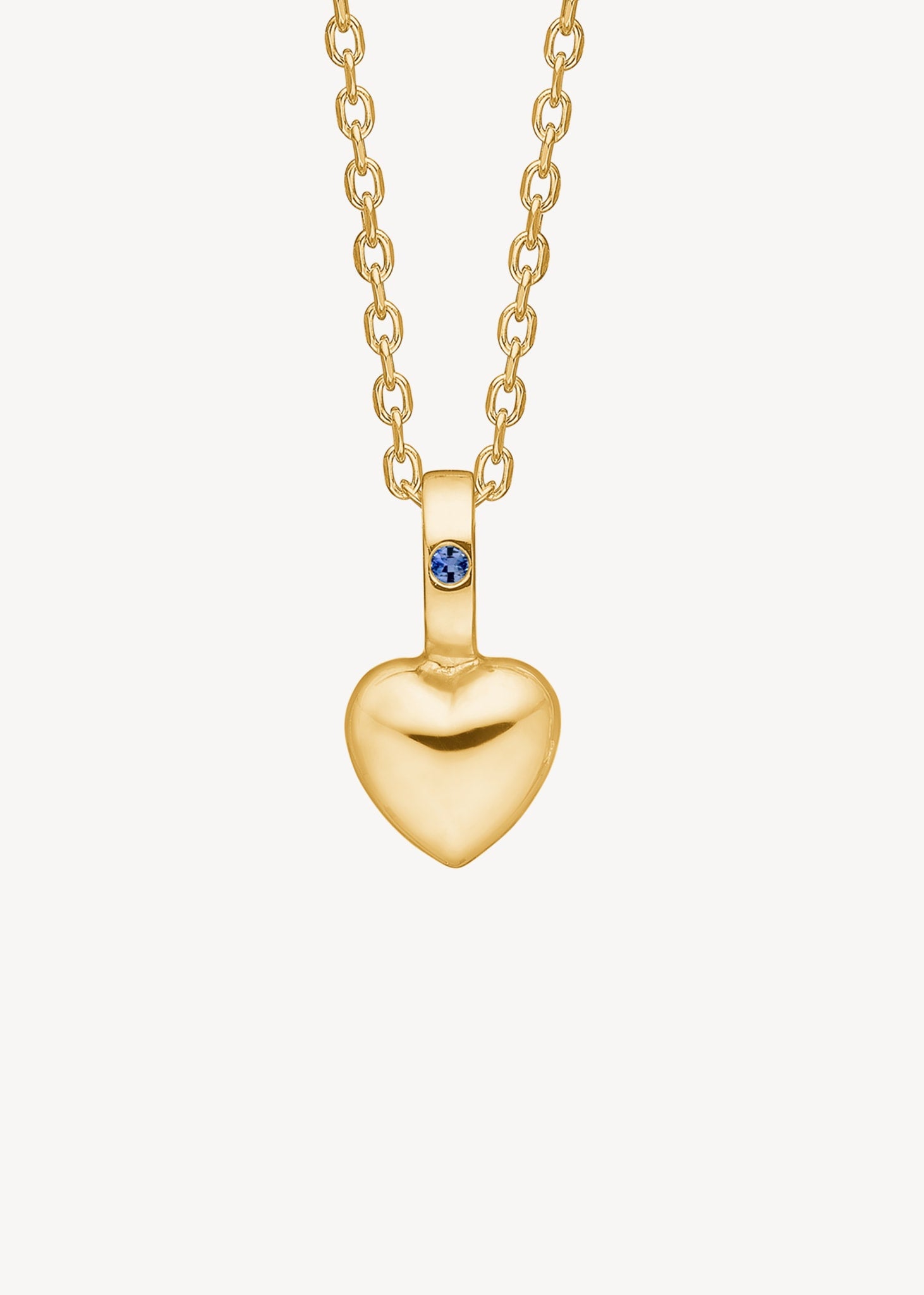 Hjerte vedhæng til halskæder i ægte 10-karat guld med en facetsleben blå safir ædelsten fra carré jewellery